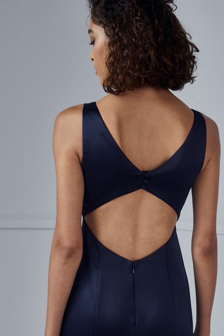 the back of a woman's bodysuit with cutouts