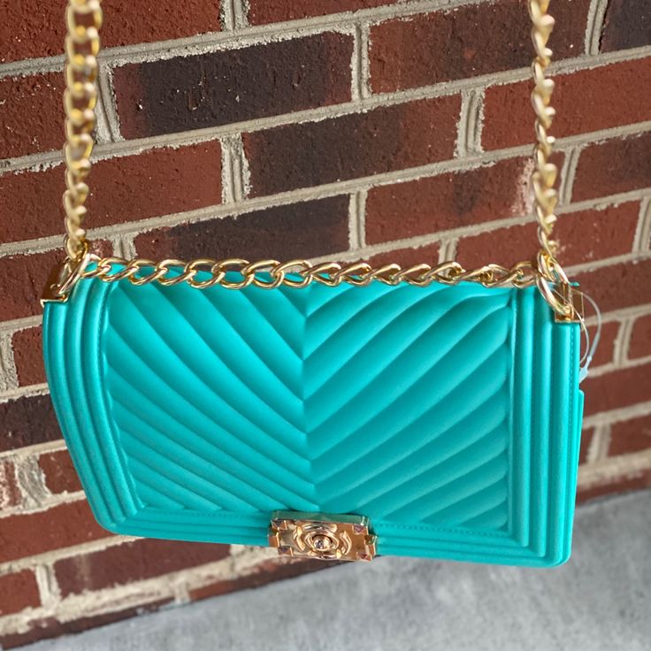 Beautiful Turquoise Jelly Bag/Purse With Gold Trim! #Cute! Dimensions - 10l X 3.5w X 6.5h/ Trendy Rectangular Turquoise Shoulder Bag, Trendy Turquoise Rectangular Shoulder Bag, Chic Turquoise Crossbody Bag, Trendy Turquoise Shoulder Bag For Daily Use, Trendy Turquoise Shoulder Bag, Chic Turquoise Rectangular Shoulder Bag, Turquoise Rectangular Casual Shoulder Bag, Chic Turquoise Bag For Daily Use, Chic Turquoise Shoulder Bag For Shopping