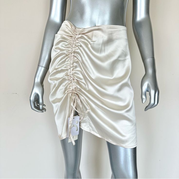 Nwt!!! Commense Skirt Size M New Condition With Tags , Pls See Photos For Measurements. Atlas Material . Elegant Short Skirt For Parties, Elegant Ruched Mini Skirt, White Ruched Elegant Skirt, Elegant White Ruched Bottoms, Elegant White Ruched Skirt, Cream Party Skirt With Relaxed Fit, Cream Relaxed Party Skirt, White Asymmetrical Ruched Skirt, White Ruched Asymmetrical Skirt