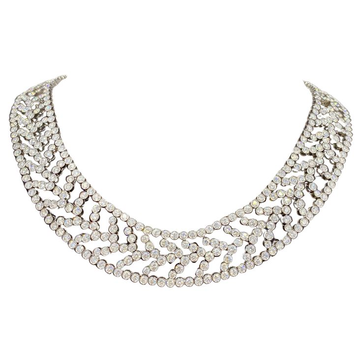 This stunning 1990s Tiffany & Co platinum and diamond choker consists of approximately 31 carats F colour VVS2 diamonds. It is beautifully supple and sits comfortably below the collar bone. The necklace has a matching bracelet which is listed separately on 1st Dibs. Luxury Jewelry Diamond Tiffany & Co., Necklace Tiffany & Co., Tiffany And Co Schlumberger Necklace, Elegant Jewelry Tiffany & Co., Tiffany Necklace Choker, Tiffney And Co Jewelry, Tiffany And Co Necklace Diamond, Chloe 2024, Tiffany And Co Necklace