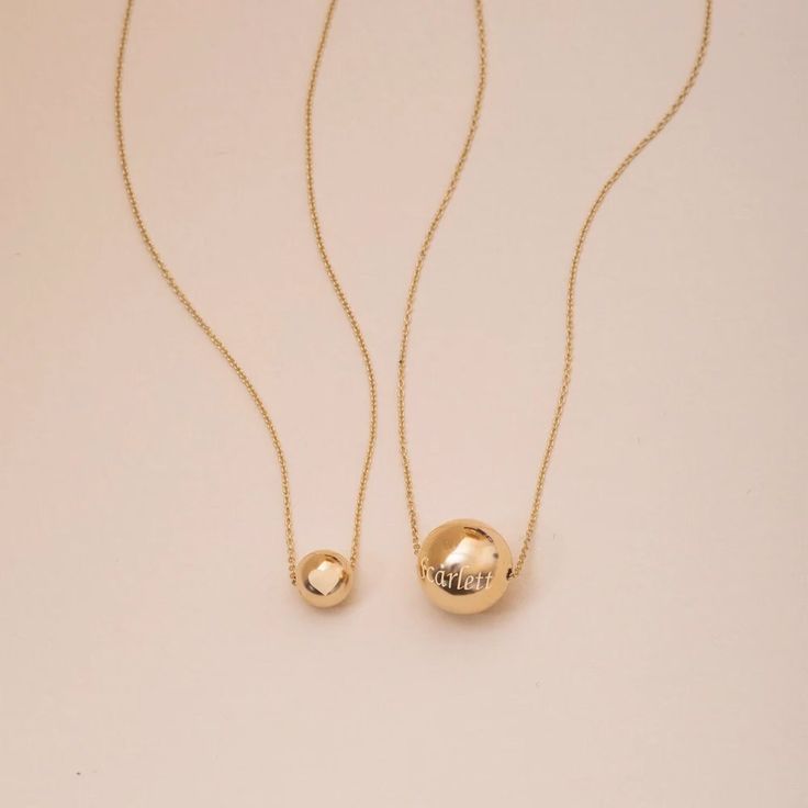 14K Real Gold Sparkle Ball Necklace, Minimalist Gold Ball Charm Necklace, Yellow Gold Hollow Bead Ball Choker Necklace, Tiny Sphere Ball Daily Necklace is a Great Gift For Her ► Adding a customized tiny bar at clasp may be a good idea: https://etsy.me/3cn9OQ5 Material: Solid Gold, real gold (not gold filled or gold plated) Karat: 14K (585) Available gold color: Yellow gold Chain Length - 14 inches Chain Length - 16 inches adjustable 15 inches (choker) Chain Length - 18 inches adjustable 16 inches Chain Length - 20 inches adjustable 18 inches Chain Length - 22 inches adjustable 20 inches We put a second circle on the chain to able to use adjustable. You can also buy the ball earring as complement this ball necklace via the following link: https://www.etsy.com/listing/653211369/14k-solid-gol Everyday 14k Gold Round Beads Necklace, Minimalist 14k Gold-filled Beaded Necklace As Gift, Minimalist Round Bead Necklaces For Gifts, Minimalist Round Bead Charm Necklace As Gift, Minimalist Adjustable Ball Chain Necklace, Minimalist Beaded Clavicle Chain Necklace For Everyday, 14k Gold Filled Ball Chain Necklace As Gift, 14k Gold-filled Ball Chain Necklace, Minimalist Jewelry With Ball Chain And Round Pendant