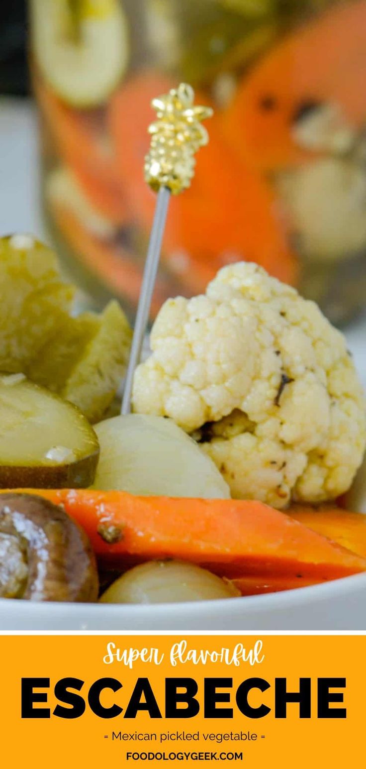 a bowl filled with cauliflower and carrots next to a jar of pickles