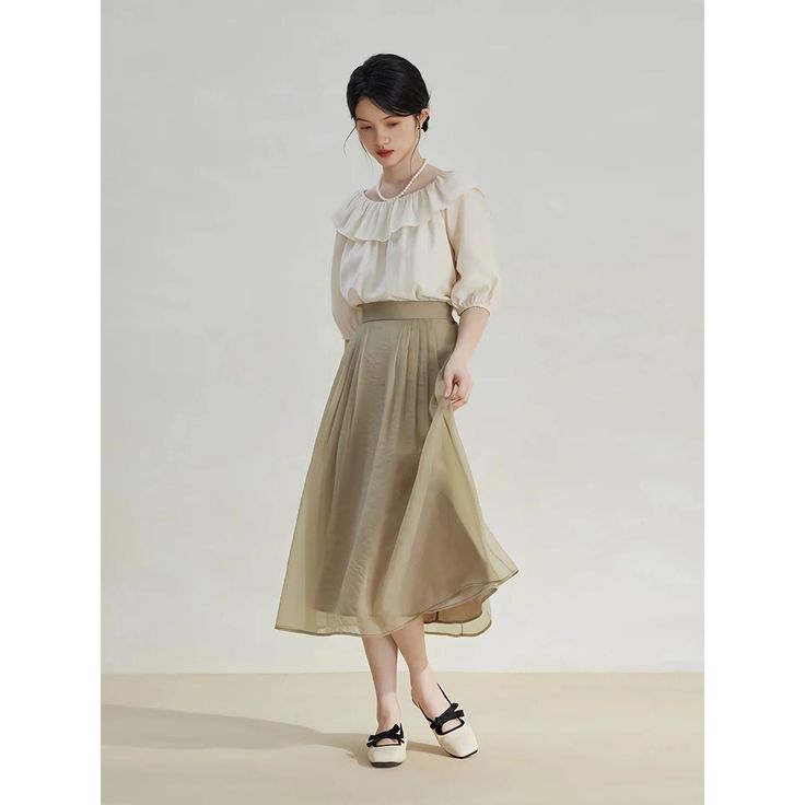 Discover Timeless Elegance Step into style with our Elegant High-Waist A-Line Mid-Calf Skirt, designed for the modern office lady who values sophistication and comfort. Crafted with a blend of high-quality nylon and polyester, this skirt epitomizes effortless elegance and durable wear. Its solid color and clean lines ensure it pairs seamlessly with both formal and casual tops, making it a versatile addition to your wardrobe. Features That Stand Out Empire Waistline: Enhances your silhouette, creating a flattering figure. Quality Fabric: Made with 51.1% Nylon and 48.9% Polyester, offering durability and comfort. Non-Stretch Broadcloth: Keeps its shape while offering a structured, polished look. Mid-Calf Length: Perfect for both office settings and social gatherings. Size chart Size Side Len Spring Office Lady Skirt, Office Lady Spring Skirt, Elegant High Waist Pleated Skirt For Summer, Elegant High-waist Skirt For Spring, Spring High-waisted Office Lady Skirt, Spring High Waist Office Lady Skirt, High Waist Office Skirt For Spring, Spring Office Flared Skirt, Elegant High Waist Office Maxi Skirt