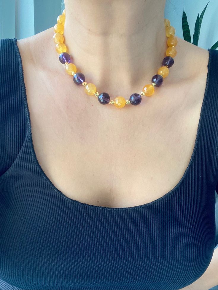 Unique Big Bold Yellow and Purple Choker Necklace, Chunky Gemstone Beaded Jewelry for Women ☀️Dimension: 42 cm +4 cm extention chain If you do not want an extension chain or need additional extension chain, please inform me. 🌈Materials:Quartz,14k gold plated 🔴 30% Discount for 2 items use the code: 2ITEMS30 🔴 35% Discount for 3 or more items use the code: MOREITEM35 Visit my shop for all designs: https://www.etsy.com/shop/MervuHandmadeJewelry ✈️Trackable Shipping Necklace comes in a jewelry box 💎Made from high-quality materials. This necklace is designed to be suitable for your use for many years to come.  Avoid direct contact with perfume, lotions and chemicals. 🍀Thank you so much your shopping 💜If you have any questions or request you can send me message at any time :) 💙 Please do Adjustable Single Strand Yellow Beaded Necklaces, Adjustable Yellow Single Strand Beaded Necklaces, Adjustable Single Strand Yellow Beaded Necklace, Adjustable Yellow Single Strand Beaded Necklace, Spiritual Yellow Jewelry With Gemstone Beads, Yellow Spiritual Beaded Necklace With Gemstone Beads, Yellow Spiritual Jewelry With Gemstone Beads, Spiritual Yellow Gemstone Beads Jewelry, Yellow Beaded Jewelry For Healing