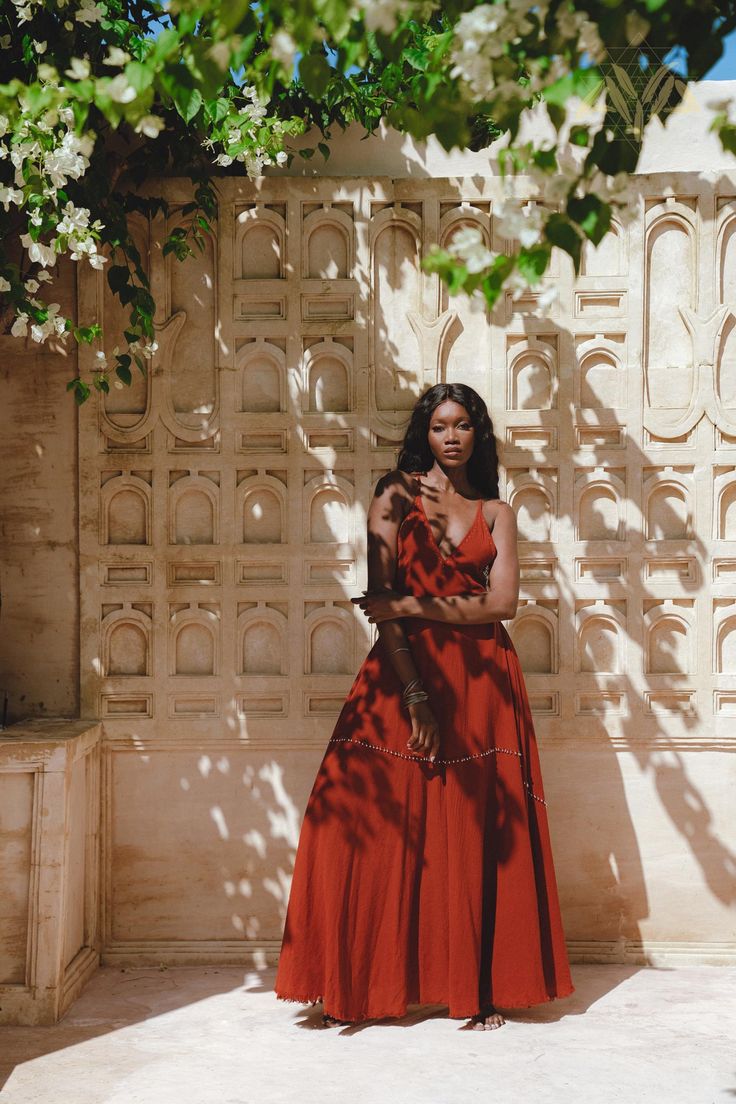 "The Red Shakti Dress"Our amazing Red flowing dress, adorned with bells around its entire diameter, truly embodies a musical and mystical persona. As you embark on your journey, a soft jingling sound follows your steps. This garment draws inspiration from Indian cultural traditions, especially the rituals performed during pilgrimages to holy lands. People in India believe that bells ward off evil spirits and generate high vibrations in our aura, which is why many religions and cultures incorpora Red Bohemian Dress For Festive Occasions, Red Maxi Dress For Party And Festivals, Red Maxi Dress For Party Festivals, Festive Bohemian Red Dress, Red Bohemian Dress For Navratri, Red Maxi Dress For Navratri, Bohemian Red Dress For Festivals, Red Bohemian Festival Dress, Bohemian Red Festival Dress