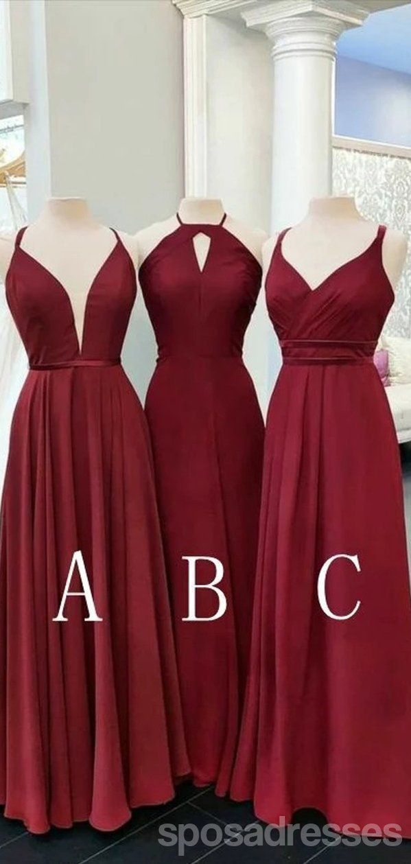 three bridesmaid dresses on mannequins with the names abc and c