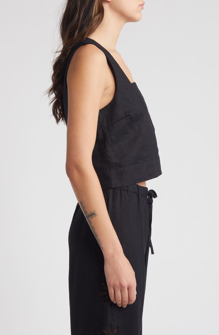 This lightweight linen tank top features a modern square neck, wide shoulder straps and an on-trend cropped hem. 18 1/2" length (size Medium) Square neck Lined 100% linen Dry clean Imported Modern Summer Crop Top, Black Linen Sleeveless Tank Top, Chic Linen Crop Top, Black Linen Casual Tank Top, Chic Sleeveless Linen Crop Top, Casual Black Linen Tank Top, Chic Black Linen Tank Top, Black Summer Top With Straight Neckline, Elegant Linen Crop Top For Summer