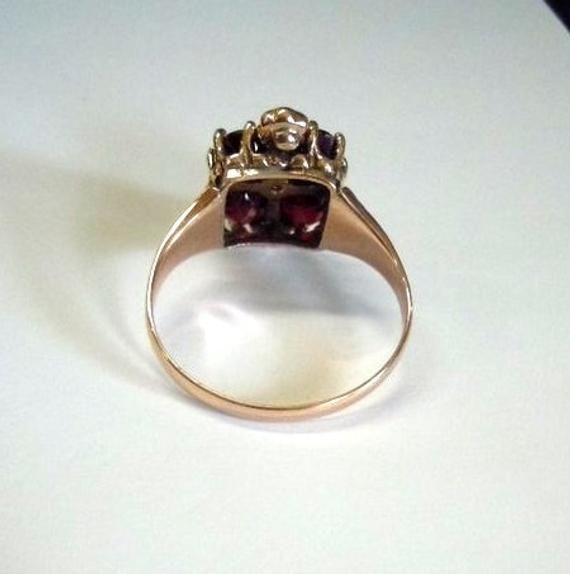 GARNET 14k ROSE GOLD RING CONTAINING 4 - 4.50 MM GARNETS & 5 ACCENT DIAMONDS. This ring is in awesome condition. All prongs have been re-tipped. It is 14K - although it is not Marked. It is size 6.25. Price: $695.00g FREE SHIPPING USA! Thank you, Gold 14k Rose Gold Diamond Ring With Center Stone, Formal 14k Rose Gold Ring With Prong Setting, Heirloom Style Rose Gold Cluster Ring, Collectible 14k Gold Diamond Ring With Rose Cut Diamonds, Heirloom 14k Rose Gold Diamond Ring In Yellow Gold, Heirloom 14k Rose Gold Ring With Brilliant Cut, Heirloom Rose Gold Brilliant Cut Cluster Ring, Heirloom Rose Gold Cluster Ring With Brilliant Cut, Rose Gold Brilliant Cut Heirloom Cluster Ring