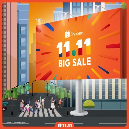 people crossing the street in front of a big sale sign with an orange background that says 11 11