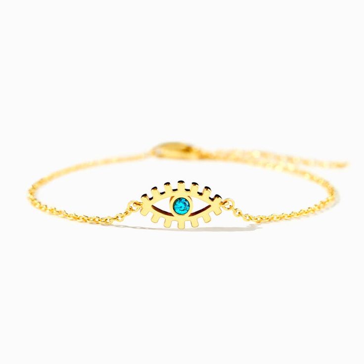 DESCRIPTION The "Evil Eye" is a universal sign of protection to ward off anyone who wants to harm you. It's also believed to bring the wearer faith, hope, strength, peace, and prosperity. This elegantly designed ojo bracelet showcases a gold colored Evil Eye, centering with a blue gemstone to create a watchful gaze. Well made with fine brass, and plated with 18k gold, this dainty blue Evil Eye jewelry is the perfect gift to bring blessings and protection to a loved one or yourself. SPECIFICATIONS Materials: AAA Grade Cubic ZirconiaMetal: Brass with 18K Gold PlatedLength: 6" with 2" Extension Evil Eye Gold Bracelet, Light Blue Evil Eye, Peace And Prosperity, Hope Strength, Blue Evil Eye, Evil Eye Jewelry, Eye Jewelry, Blue Gemstones, Faith Hope