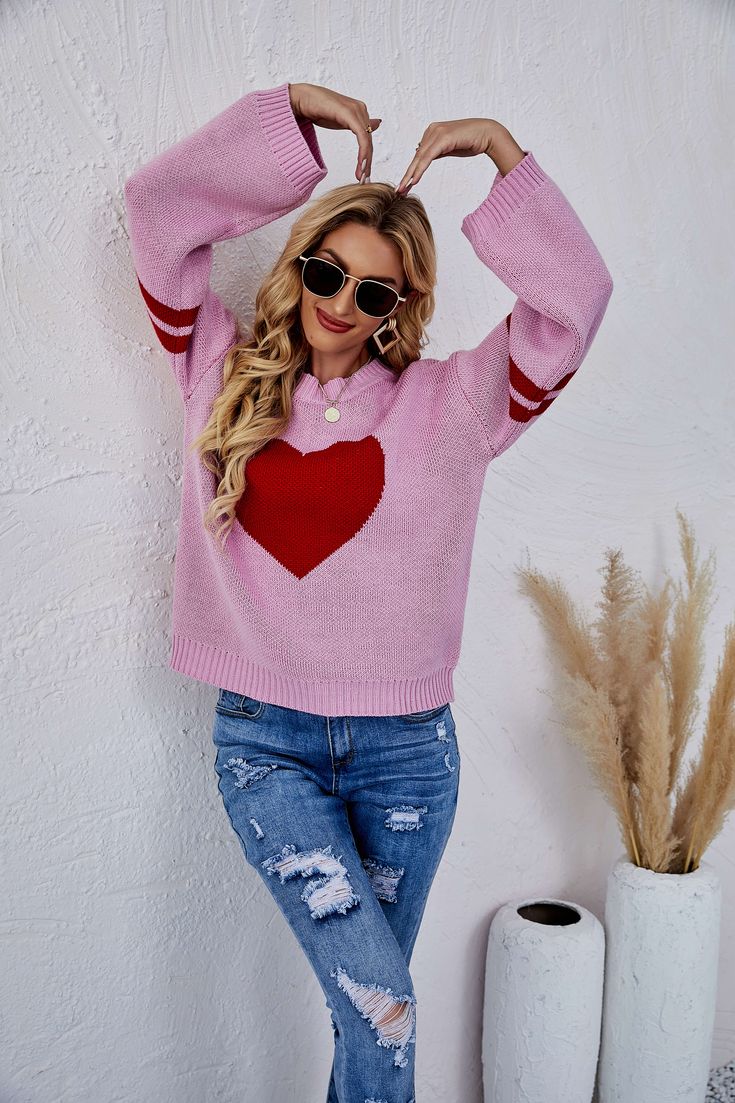 Get cozy and cute with our Heart To Heart Pullover Knit Sweater. This playful sweater features a heart design, making it perfect for spreading love and warmth. Stay stylish and comfortable with this unique and quirky addition to your wardrobe. Add some heart to your look today! Size Guide: Model is 5’62” tall, and has a 32.6” bust, 24.2”waist, & 35.9” hips. She is wearing a S / US 4 / AU 8. This top is true to size. Feature: Mock Neckline. Drop shoulders. Long Sleeves. Soft Knit Fabric. Front he Casual Heart-shaped Winter Sweater, Casual Heart-shaped Sweater For Winter, Cute Heart Print Winter Sweater, Cute Winter Sweater With Heart Print, Trendy Heart Print Sweater For Winter, Casual Heart Print Sweater For Winter, Trendy Heart Graphic Sweater For Fall, Casual Winter Sweater With Heart Print, Cozy Crew Neck Sweater With Heart Print