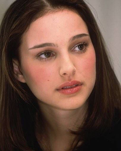 a close up of a person with long hair