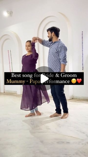 a man and woman dancing in an empty room with the caption best song for pride & groom