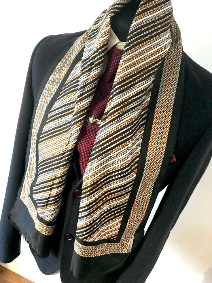 About: A 60's vintage silky scarf is a must have and a great addition to any wardrobe. This retro necktie is an all original vintage and authentic pre-loved stole. If you are looking for vintage scarves or luxury neckties you have come to the right place, we have a variety of men's vintage and women's vintage scarves. Please visit our shop to view our huge range of retro ties, cravats and scarves. www.etsy.com/uk/shop/DeadretroShop Materials: polyester  Measurements: Length: 50 inches  Width: 12 Formal Multicolor Silk Scarves, Classic Multicolor Silk Scarf For Formal Occasions, Classic Business Scarves With Ties, Classic Silk Scarves With Ties, Classic Business Scarves, Vintage Silk Scarf For Formal Occasions, Vintage Multicolor Silk Scarf For Formal Occasions, Multicolor Vintage Silk Scarf For Formal Occasions, Formal Silk Scarves With Ties