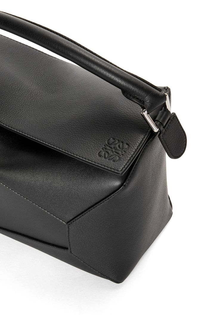 [vc_row][vc_column width=”1/3″][vc_column_text text_larger=”no”] LOEWE LOEWE Puzzle bag in classic calfskin The Puzzle bag is the debut bag for LOEWE by Modern Geometric Leather Bags, Geometric Leather Shoulder Bag For Evening, Chic Geometric Leather Bag, Geometric Leather Evening Bag, Luxury Geometric Shoulder Bag For Everyday Use, Modern Structured Calf Leather Bags, Elegant Geometric Leather Bags, Modern Calf Leather Rectangular Satchel, Modern Rectangular Calf Leather Bag