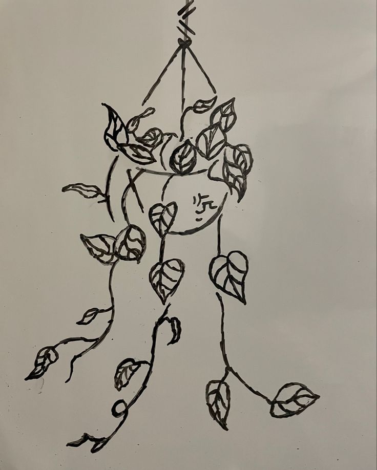 a drawing of a woman's face with flowers and leaves on her head, in the shape of a tree