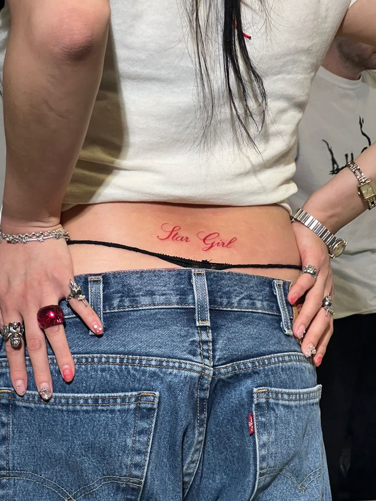 a woman's stomach with the word love on it