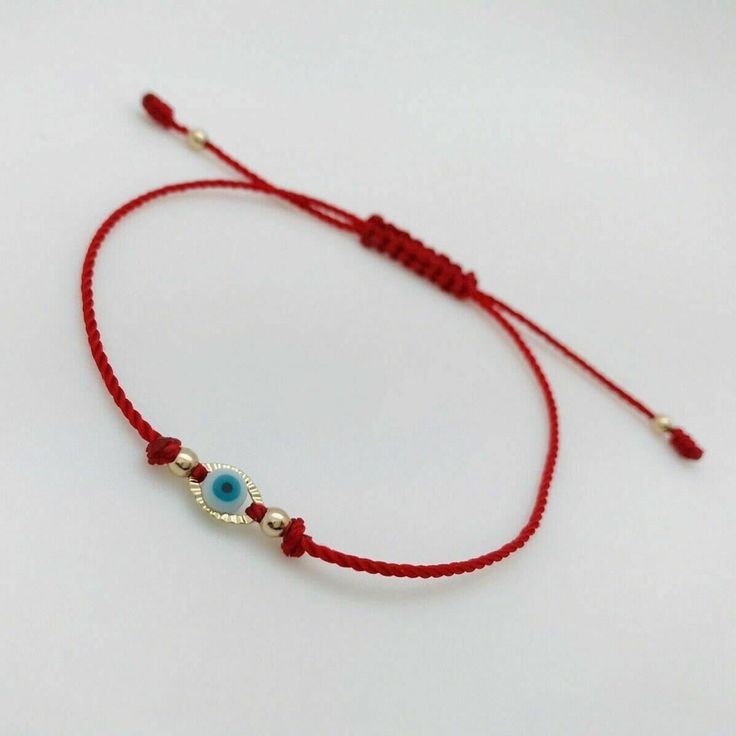 Pulsera roja con ojo Turco de oro laminado, ajustable. Hecha a mano. Red string protection bracelet with Turkish eye (gold filled), hand made. Gold Braided Bracelet With Evil Eye As Gift, Gold Braided Evil Eye Bracelet As A Gift, Gold Braided Bracelet With Evil Eye For Gift, Gold Spiritual Friendship Bracelets With Evil Eye, Adjustable Handmade Gold Evil Eye Bracelet, Gold Evil Eye Bracelet With Sliding Knot As Gift, Gold Evil Eye Bracelet With Adjustable Length As Gift, Adjustable Yellow Gold Evil Eye Bracelet, Red Evil Eye Bracelets For Good Luck