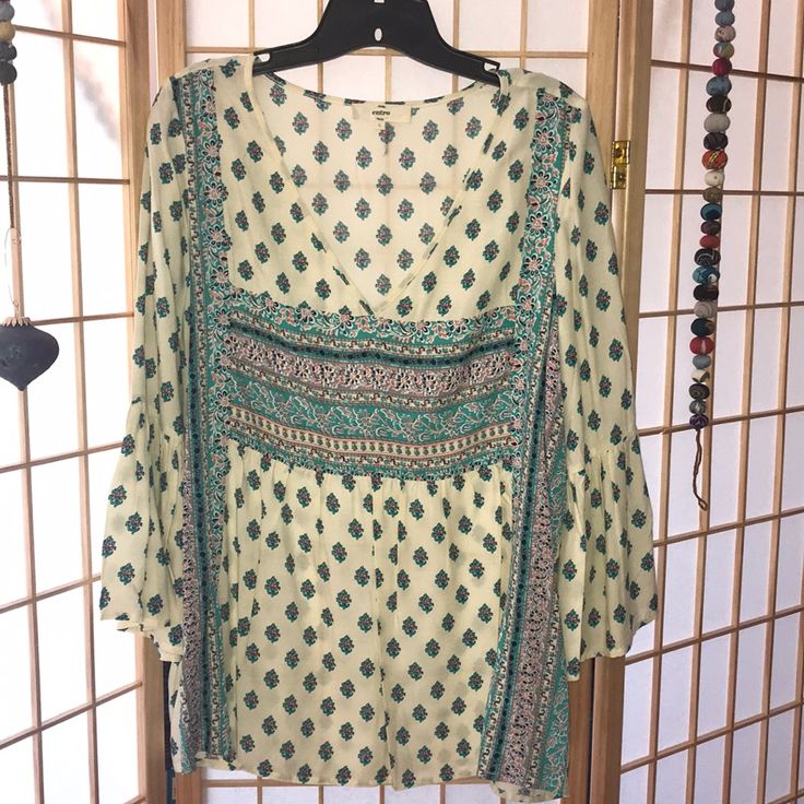 Entro Boho Top. Deep V-Neck, Tunic Length, Semi Baby-Doll Fit. Multiple Patterns Creates Flattering Designs. Flowy, Lightweight Fabric. Extra Detail On Sleeve. Size L. Nwot. Green V-neck Tops For Festival, Green Boho Print Long Sleeve Top, Green Long Sleeve Top With Boho Print, Green Long Sleeve Boho Print Top, Green Bohemian Peasant Top For Vacation, Green Bohemian Peasant Top For The Beach, Green Bohemian Peasant Top For Beach, Green Summer Peasant Top For Beach, Bohemian Green Peasant Top For Beach