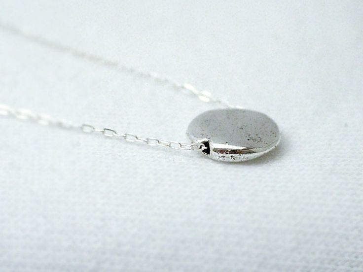 Silver disc necklace - modern simple jewelry A silver plated circle disc that's has a organic flat look is strung on a sterling silver chain. A simple and modern necklace that's perfect to wear everyday. measurements disc- 10mm chain length- 16inches >i'm more than happy to adjust the length of this necklace up to 18inches for no additional charge.< ♦you can enter shop here! http://etsy.com/shop/illusy Minimalist Coin Necklace With Delicate Chain For Everyday, Minimalist Coin Necklace With Delicate Chain, Minimalist Coin Necklace With Round Pendant, Everyday Minimalist Coin Necklace With Delicate Chain, Everyday Minimalist Coin Necklace, Minimalist Coin Necklace With Adjustable Chain, Minimalist Sterling Silver Coin Necklace With Delicate Chain, Minimalist Everyday Coin Necklace With Round Pendant, Minimalist Coin Necklace With Adjustable Chain And Round Pendant