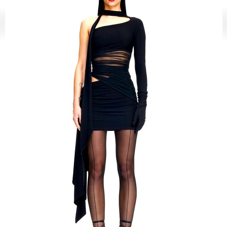 Mugler H&M. Short, Figure-Hugging Dress In Viscose Jersey Crpe And See-Through Mesh. The Dress Is Cut From Skin-Baring Panels With Stunning All-Over Draping Which Are Wrapped Around The Body In The Recognisable Designer Style. Extra-Wide Ties At The Neck And Hip. One-Shoulder Style With An Asymmetric Cut At The Top, A Stand-Up Collar And One Long Sleeve Ending With A Detachable Glove That Has A Concealed Press-Stud. Concealed Zip At One Side With A Star-Shaped Zip Pull. Composition Shell: Polyam Thierry Mugler Dresses, Fitted High Fashion Dresses For Night Out, High Fashion Fitted Dresses For Night Out, Fitted Asymmetrical Long Sleeve Dress For Evening, Party Dresses With Belted Mini Length, Black Fitted Dress In High Fashion Style, High Fashion Fitted Black Dress, Black Fitted Dress High Fashion, High Fashion Fitted Spring Dress