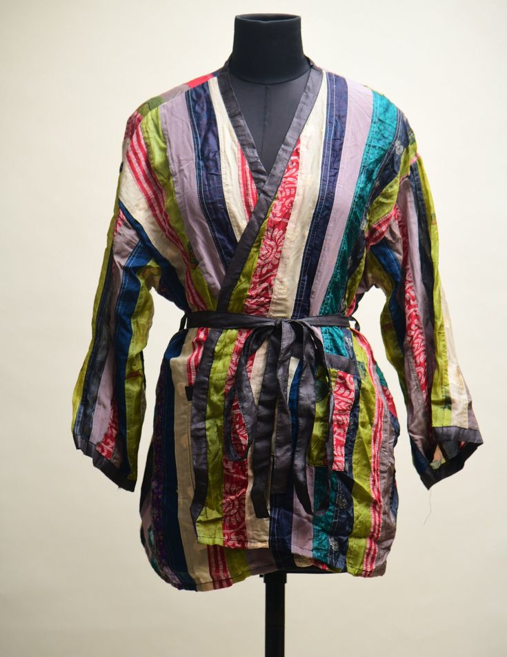 WOW !!first time in Etsy ! we are presenting this multicoloured Boho patch work style short kimono duster inspired from 90s era.  -Size :- Length - 31"inches Bust - 66"inches Sleeves - 17.5"inches Width  -  8.5 inch(approx.) Anybody can were this amazing vintage silk robe that is the best part of it. -Quality- 100% silk  -condition- Almost new type of condition if you are a vintage lover I'm sure you gonna  love this lounge wear  piece and not going to stop your self  for 5 star review. -Washing care - easy gentle wash or dry-clean for better life of silk. -Best occasion for wearing this cardigan. beach, lounge, boho hippie festival, Bachelorette party, wedding party, Christmas party, new year party, bridal shower,  birthday party, kitty party, maternity wear, Han party and i forget to men Multicolor Long One-size Kimono, Hippie Multicolor Kimono With Kimono Sleeves, One Size Multicolor Kimono For Festivals, Multicolor Hippie Kimono With Kimono Sleeves, Multicolor Patchwork Kimono For Spring, Bohemian Multicolor Robe For Festivals, Multicolor Free Size Long Sleeve Kimono, Multicolor Cotton Robe For Festival, Hippie Style Multicolor Wrap Kimono