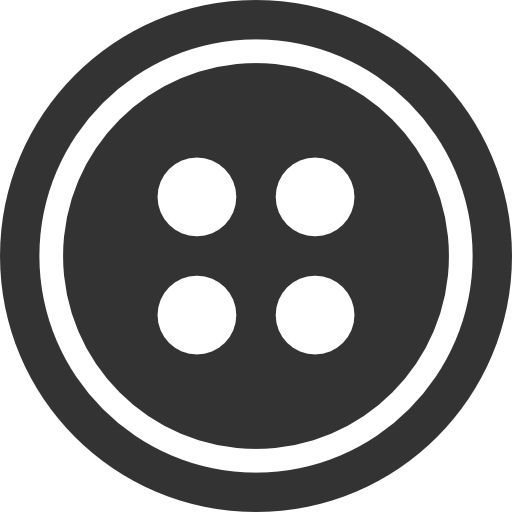 a black and white button with four dots