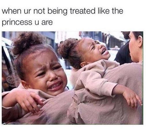 a woman holding a child with the caption when you're not being treated like the little princess you are