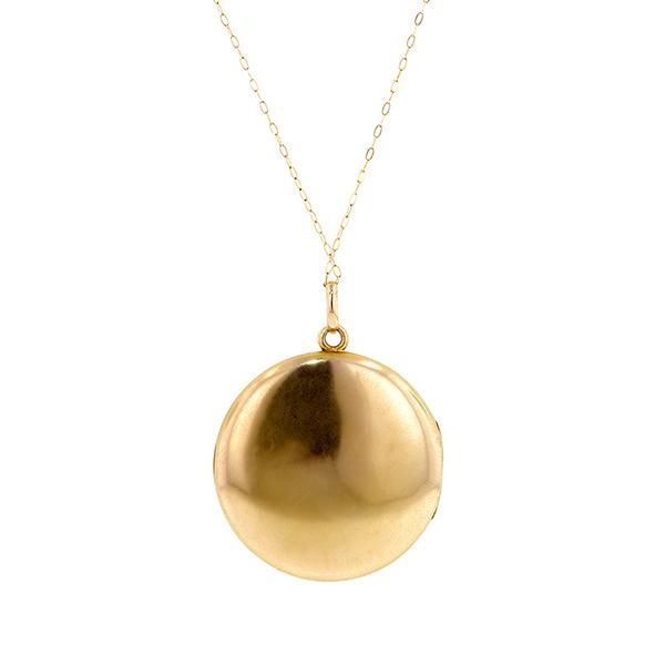 Measuring app. 1 3/8 (including bail) x 1 1/16 inch, featuring a monogram on one side, suspended from 18 inch chain, fashioned in 10k gold. T. Eaton & Co. Mid 20th century. Luxury Round Pendant Locket Necklace, Luxury Vintage Round Pendant Locket Necklace, Gold Medallion Locket Necklace Stamped 14k, Antique Medallion Locket Necklace Stamped 14k, Victorian Round Locket Necklace Stamped 14k, Vintage 14k Gold Locket Necklace Stamped 14k, Vintage 14k Gold Locket Necklace, Victorian Yellow Gold Locket Necklace For Formal Occasions, Antique 14k Yellow Gold Locket Necklace