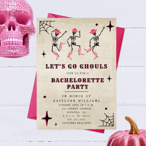 a pink and white halloween party with a skeleton