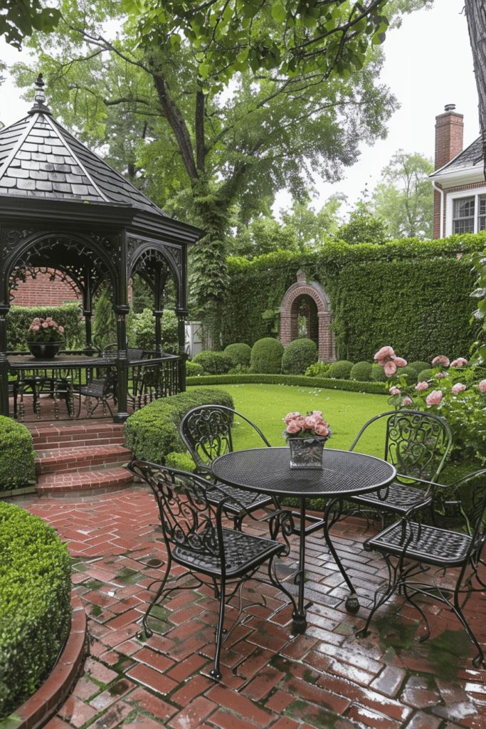 a gazebo in the middle of a lush green garden with pink roses on it