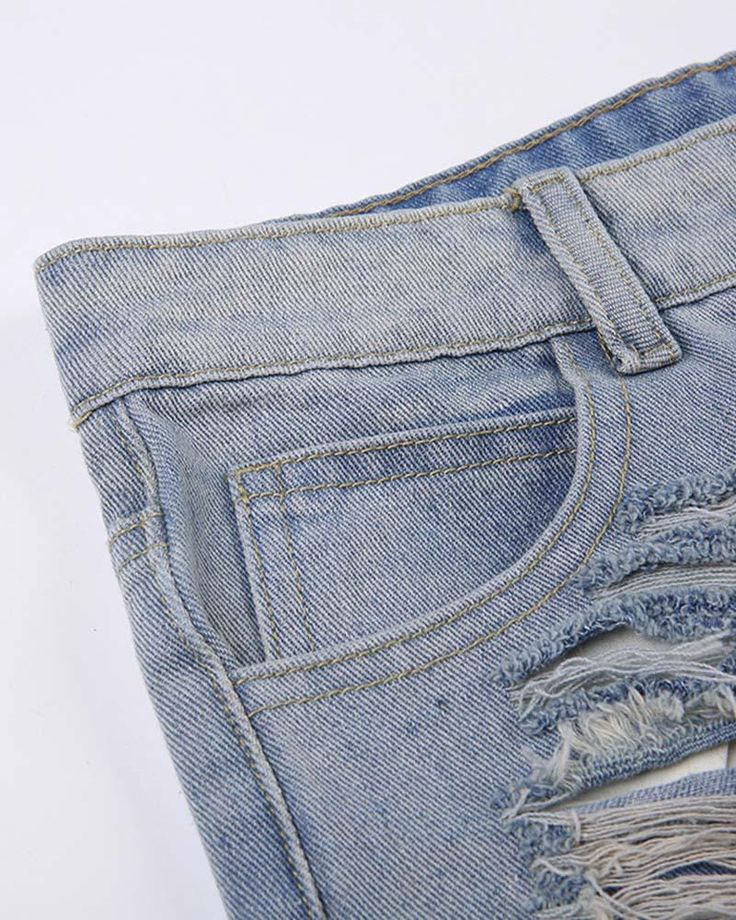 Details: Denim shorts with rip-off designBottom Length: ShortMaterials:75% Cotton + 25% Polyester Summer Cotton Jeans With Holes, Casual Summer Bottoms With Holes, Casual Denim Bottoms With Distressed Detail, Casual Denim Bottoms With Holes, High Rise Summer Bottoms With Holes, Spring Ripped Medium Wash Jean Shorts, Ripped Medium Wash Jean Shorts For Spring, Casual Ripped Cutoff Jean Shorts, Distressed Denim Blue Mid-rise Shorts