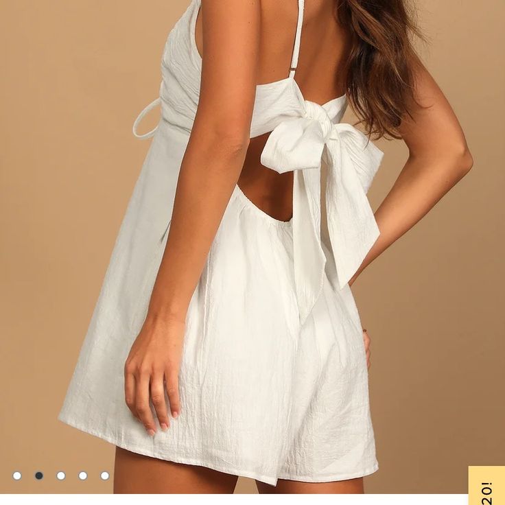 Textured Cotton Romper With Linen Feel. V Neckline With Tie And Adjustable Spaghetti Straps. Open Back With Tying Detail. Fully Lined With Pockets! In Like-New Condition, Never Worn! Perfect For A Honeymoon Or Beach Vacation! White Tie Waist Jumpsuits And Rompers For Vacation, White Summer Jumpsuit With Tie Waist, Summer White Backless Jumpsuits And Rompers, White Tie-back Jumpsuits And Rompers For Summer, White Backless Jumpsuits And Rompers For Day Out, Fitted White Jumpsuit With Tie Back, White Fitted Jumpsuit With Tie Back, Chic White Jumpsuits And Rompers With Tie Back, Chic White Tie-back Jumpsuits And Rompers