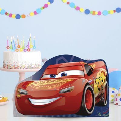 a birthday cake with the character cars on it