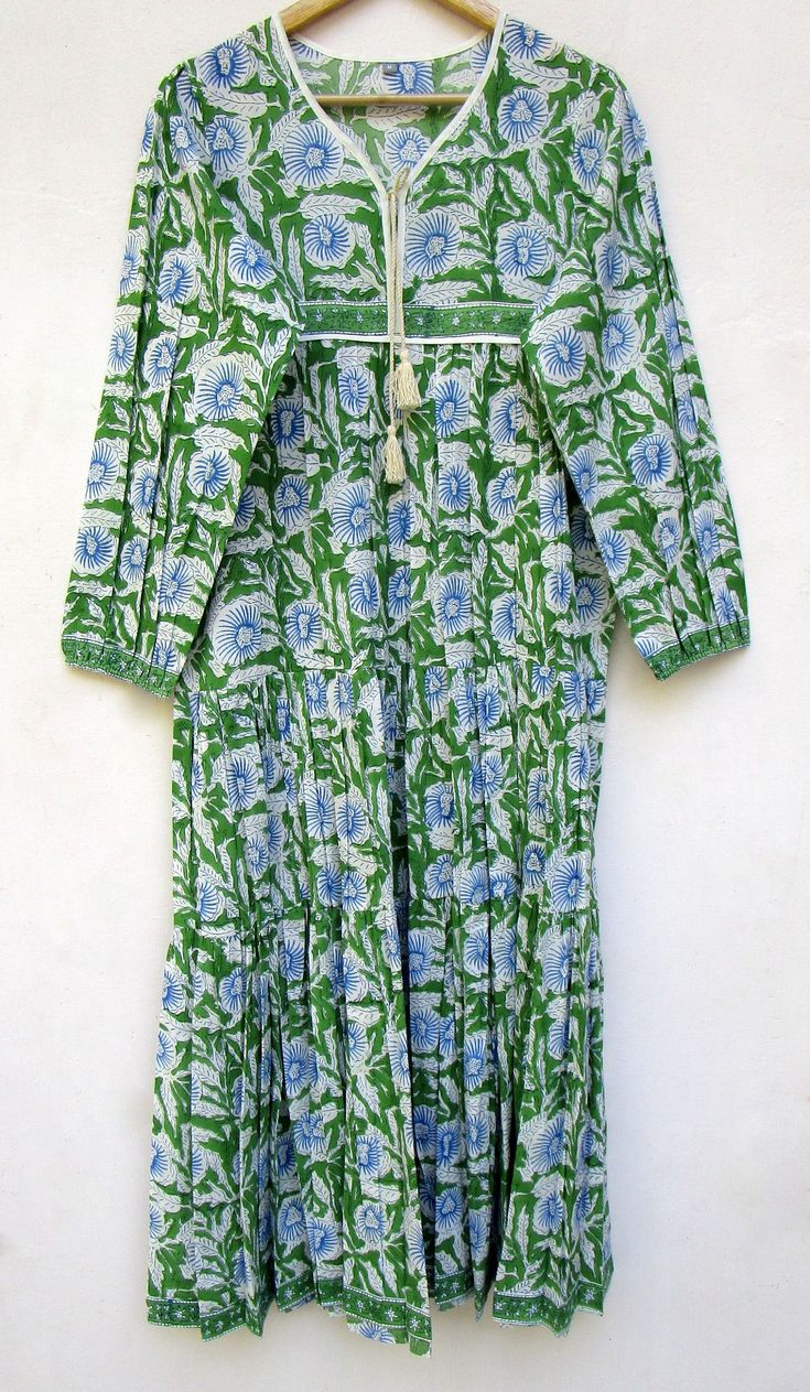 "ITEM DESCRIPTION green & blue cool floral printed maxi dress - long sleeve with tassel dress - v neckline maxi dress Features : Long sleeve, V neck, Long dress Material : 100% cotton cambric Fabric: 100% cotton soft light weight ethnic print fabrics Sleeve Length = 22 inch For more sizes & their measurement, please refer our below chart to understand the sizes variations available with us For your size requirement, please mention your size in seller note at the time of buying. SIZE MEAS Non-stretch Long Sleeve Maxi Beach Dress, Non-stretch Long Sleeve Maxi Dress For Beach, Green V-neck Boho Dress For Spring, Spring Beach Non-stretch Maxi Dress, Spring Beach Maxi Dress Non-stretch, Non-stretch Green Maxi Dress, Non-stretch Maxi Dress For Spring Beach Occasions, Green Maxi Dress Regular Fit, Non-stretch Summer Maxi Dress