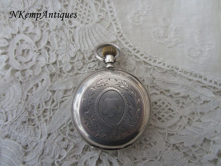 Antique silver pocket watch 1900 6cm please note all my watches are sold as not working Antique Silver Pocket Watch For Formal Occasions, Silver Pocket Watch With Stopwatch As Gift, Antique Engraved Silver Pocket Watch, Silver Pocket Watch With Locket For Formal Occasions, Formal Silver Pocket Watch With Locket, Formal Silver Locket Pocket Watch, Silver Locket Pocket Watch For Formal Occasions, Silver Locket Watch For Formal Occasions, Antique Silver Pocket Watch With Locket