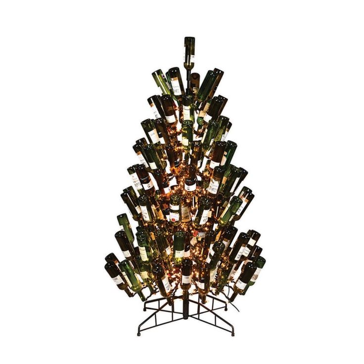 a tree made out of wine bottles with lights on it's top and bottom