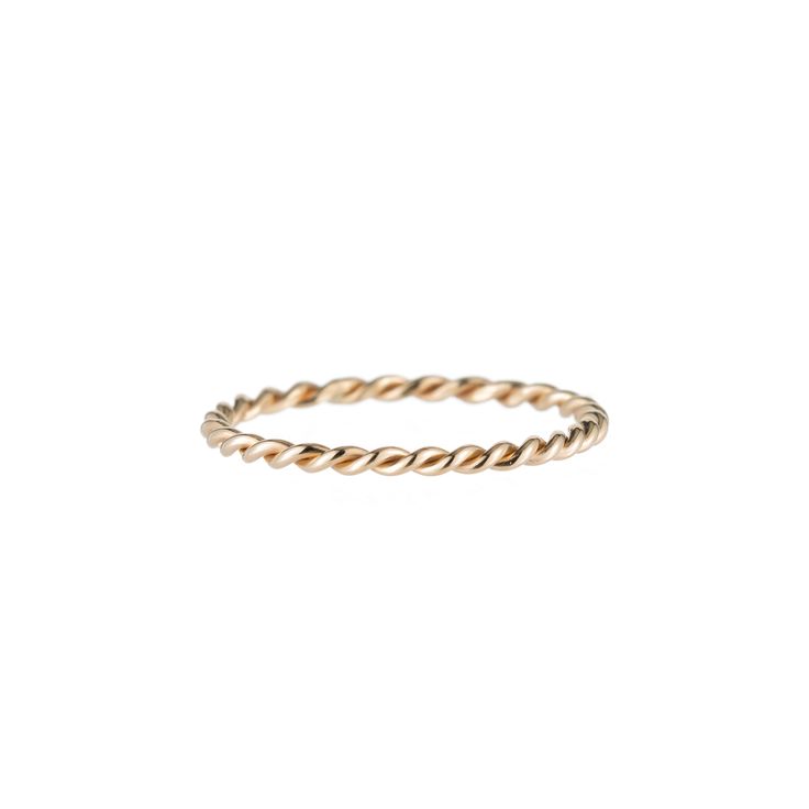 Description Perfect for every day, our Skinny Twine Ring is made from 2 wires coiled together by hand—the epitome of classic, unending style. Wear this band solo or stack it up for a more bold look. Handmade with love in Los Angeles. Measurements & Materials Height: 1/20" 14k yellow gold Gold Rings For Women, Rings Hand, Bubble Ring, Birthstone Rings, Ring Stack, Traditional Wear, 14k Gold Ring, Sandals For Sale, Handmade With Love