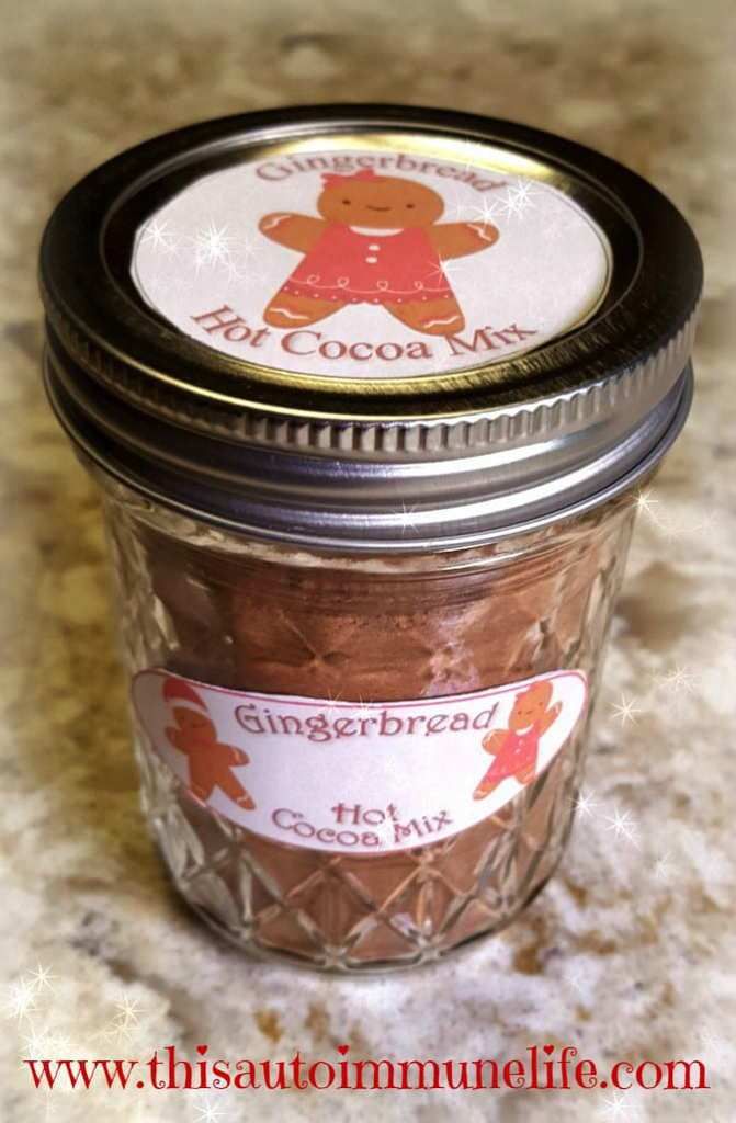 a jar filled with gingerbread cookies sitting on top of a counter