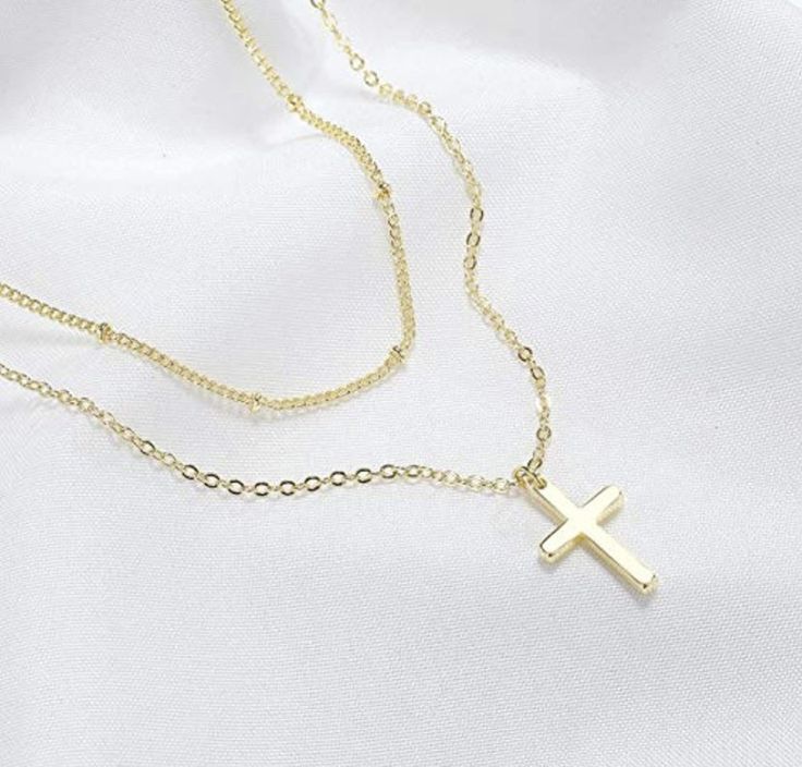 Super cute and dainty tiny cross charm on dainty chain 18k gold plated, Silver plated, 18k gold filled, or sterling silver. Gold vermeil sterling silver charm. Hypoallergenic nickel & lead free material -Silver plated cable chain -Silver plated satellite chain -18k Gold plated cable chain -18k Gold plated satellite chain -Sterling silver cable chain (read description below) -14k gold filled cable chain (read description below) Simple, Dainty, Delicate, yet so Elegant and Romantic. The shine Gold Adjustable Minimalist Cross Necklace, Delicate Yellow Gold Layered Necklace For Gift, Delicate Yellow Gold Layered Necklace Gift, Gold Dainty Cross Necklace With Adjustable Chain, 14k Gold Filled Layered Clavicle Chain Necklace As Gift, 14k Gold-filled Layered Clavicle Chain Necklace As Gift, Gift 14k Gold Filled Layered Clavicle Necklace, Dainty 14k Gold-filled Cross Necklace, Dainty Charm Necklace With Clavicle Chain And Cross Pendant