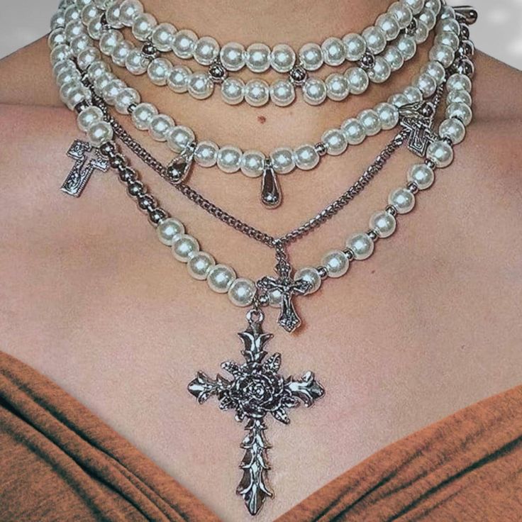 [Click ❤ to get 15% OFF coupon code by Email / Receiving an email from seller should be turned ON] Elevate your style with this Layered Gothic Pearl Necklace Set, a stunning blend of vintage and modern punk aesthetics. Featuring 4 layered faux pearl necklaces and a bold gothic cross pendant, this versatile piece can be worn as a full statement or separated into individual necklaces for a more subtle look. Crafted from high-quality zinc alloy and artificial pearls, this necklace is lightweight, d Gothic Cross Necklace, Punk Aesthetics, Modern Punk, Layered Pearl Necklace, Gothic Cross, Grunge Y2k, Pearl Necklace Set, Goth Jewelry, Vintage Inspired Fashion