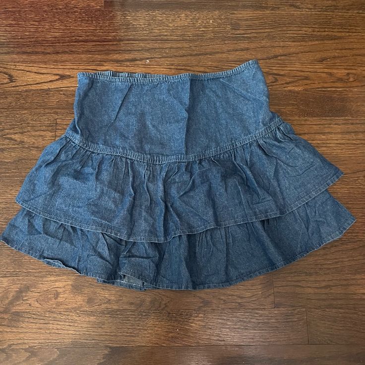 Denim Mini Skirt With Ruffles, In Good Condition, New, Never Worn. No Underskirt Could Fit A Medium As The Back Is Stretchy. High Waist Cotton Mini Skirt With Ruffles, High Waist Cotton Skort With Ruffles, High-waisted Cotton Skort With Ruffles, Cotton Ruffled Mini Denim Skirt, Ruffled Cotton Denim Mini Skirt, Ruffled Mini Length Denim Skirt, Cotton Denim Mini Skirt With Ruffles, High Waist Cotton Denim Skirt With Ruffles, Denim Blue Ruffled Skirt