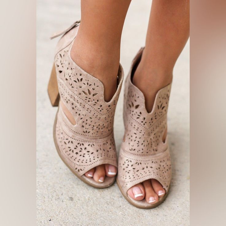 Hello Cute Booties! Our Santana Cream Booties Are Perfect For That Transitional Time Between Winter And Spring! It Features Cute Cut Outs Along The Body And Has A Peep Toe Opening. Pair It With Anything From Our Online Boutique, You Can't Go Wrong With These Cuties! Approx. Heel Height: 3.75 Inches Faux Leather Zipper On Back Perforated (Cut Out) Design On Body Color: Cream Spring Beige Booties, Spring Cream Booties With Almond Toe, Spring Cream Almond Toe Booties, Cream Block Heel Booties For Spring, Beige High Heel Booties For Spring, Beige Open Toe Boots Medium Width, Casual Beige Booties With Block Heel, Chic Beige Booties For Spring, Casual Cream Booties For Spring