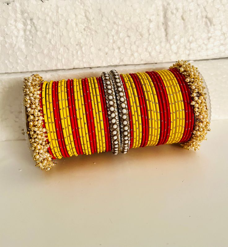 Beautiful traditional bangles red and yellow Color combinations  Material: thread work Size available only 2.6 You can use them for both hand  need any help plz combo me And please visit my shop here at http://etsy.com/shop/designerjewelry2 thank you Handwork Multicolor Bangle Jewelry, Multicolor Handwork Bangle As Gift, Multicolor Handwork Jewelry For Diwali, Festive Multicolor Handwork Bangle, Festive Multicolor Handwork Jewelry, Handwork Bracelets For Festivals, Festive Thread Bangle Bracelets, Multicolor Handwork Bracelets As Gift, Festive Thread Bangle Jewelry