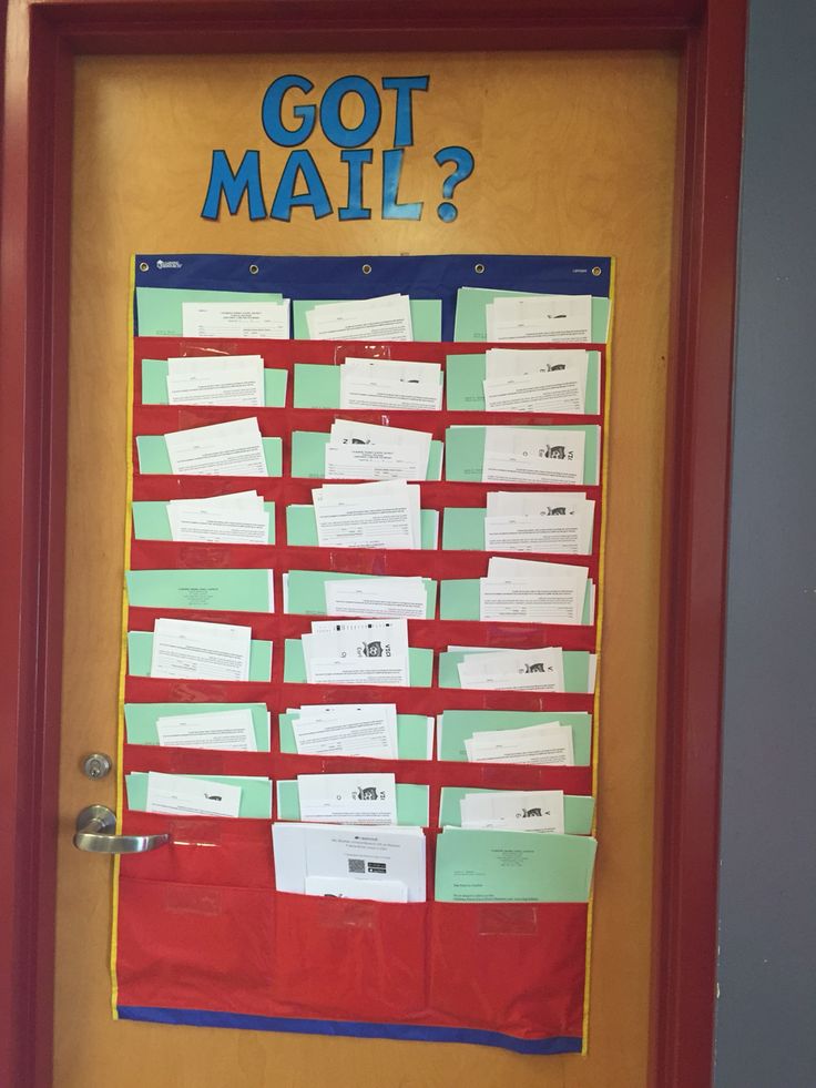 a bulletin board that has been decorated with post - it notes and the words got mail?