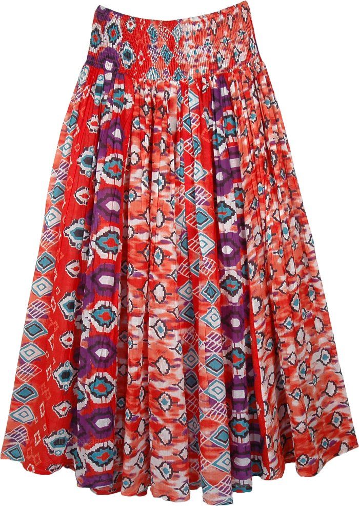 A full length flared skirt in a beautiful Bulgarian red color with hints of purple, white and blue.  The skirt features an Ikat-style printed design and gives it an exquisite look. #tlb #MaxiSkirt #Dance #Floral #Printed #summercottonskirt #cottonvoilefabricskirt #flaredbohoskirt Casual Red Gathered Skirt, Red Skirt With Elastic Waistband For Spring, Red Gathered Skirt Bottoms For Summer, Red Summer Skirt With Elastic Waistband, Red Skirt With Elastic Waistband For Summer, Red Relaxed Skirt For Summer, Red Pleated A-line Maxi Skirt, Red Relaxed Fit Skirt For Summer, Red Cotton Long Skirt