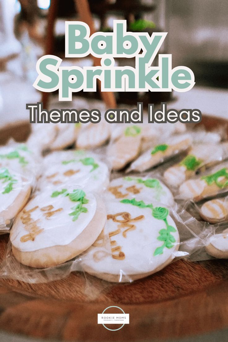 baby sprinkle cookies on a wooden platter with the words, themes and ideas