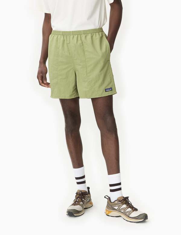 Patagonia baggies shorts (5in) in buckhorn green: these versatile shorts are perfect for land or sea with a mesh liner and quick-drying netplus® material made from recycled fishing nets helping to reduce ocean pollution.    the 5" inseam and fair trade certified™ factory make them both functional and ethical. get ready to take on the great outdoors in style!    product details —    — material: netplus® 100% postconsumer recycled nylon  — durable water repellent (dwr) finish  — recycled polyester Patagonia Sale, Patagonia Shop, Patagonia Baggies, Ocean Pollution, Patagonia Shorts, Fishing Nets, Black Aviators, Neon Purple, Modern Wardrobe