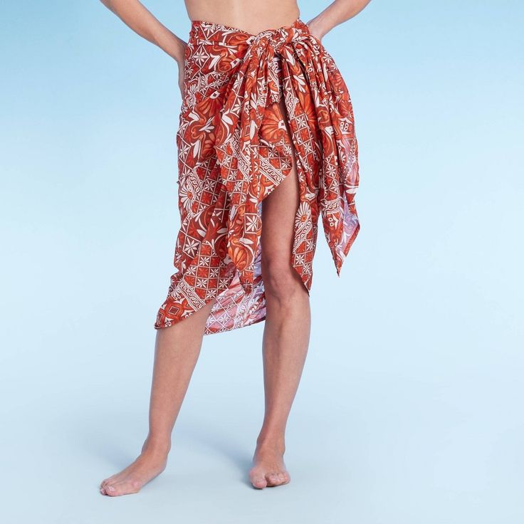 Get ready for beachside adventures in chic style with this Side-Tie Cover-Up Sarong from Shade & Shore™. This sheer cover-up sarong features an intricate pattern in brown and white and is made from breathable cotton gauze for comfortable wear. A side-tie design completes the look and provides a figure-flattering fit. Simply add a bikini top, strappy sandals and a sun hat to complete your summery outfit. Shade & Shore™: Found exclusively at Target. Beach Season Cover-up With Tie Waist, Summer Sarong For Beach Cover-up, Tropical Tie-side Sarong For Vacation, Tropical Vacation Sarong With Tie-side, Summer Cover-up With Tie Waist For Beach Season, Casual Beach Cover-up With Tie-side Bottom, Tropical Tie-side Sarong For Beach Cover-up, Casual Tie-side Bottom Beach Cover-up, Beachy Tie Waist Swimwear For Beach Season