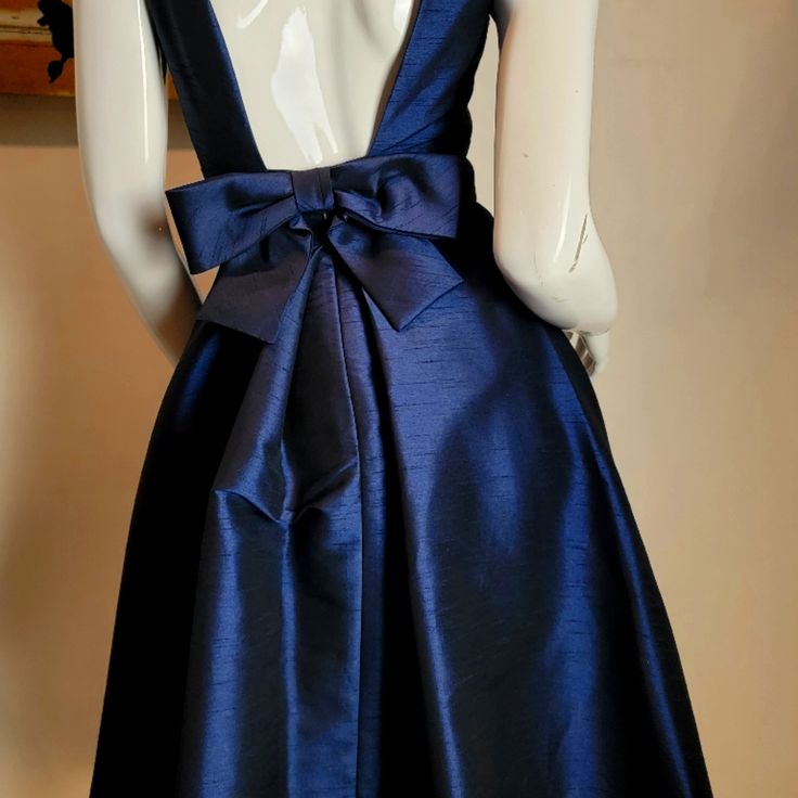 This Dress Is Gorgeous...The Fit Is Amazing! Midnight Blue Silk Dress, Navy A-line Evening Dress, Chic Blue Dress With Tie Back, Chic Blue Tie-back Dress, Navy Sleeveless Midi Party Dress, Navy Sleeveless Midi Dress For Party, Elegant Royal Blue A-line Dress, Navy A-line Midi Dress For Party, Blue A-line Midi Dress For Formal Occasions